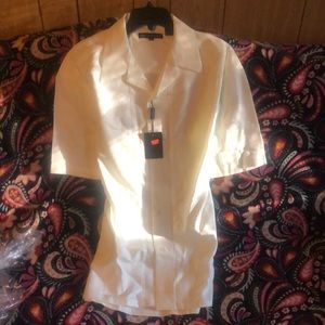 I cream color button and pants outfit. Still band new never worn.